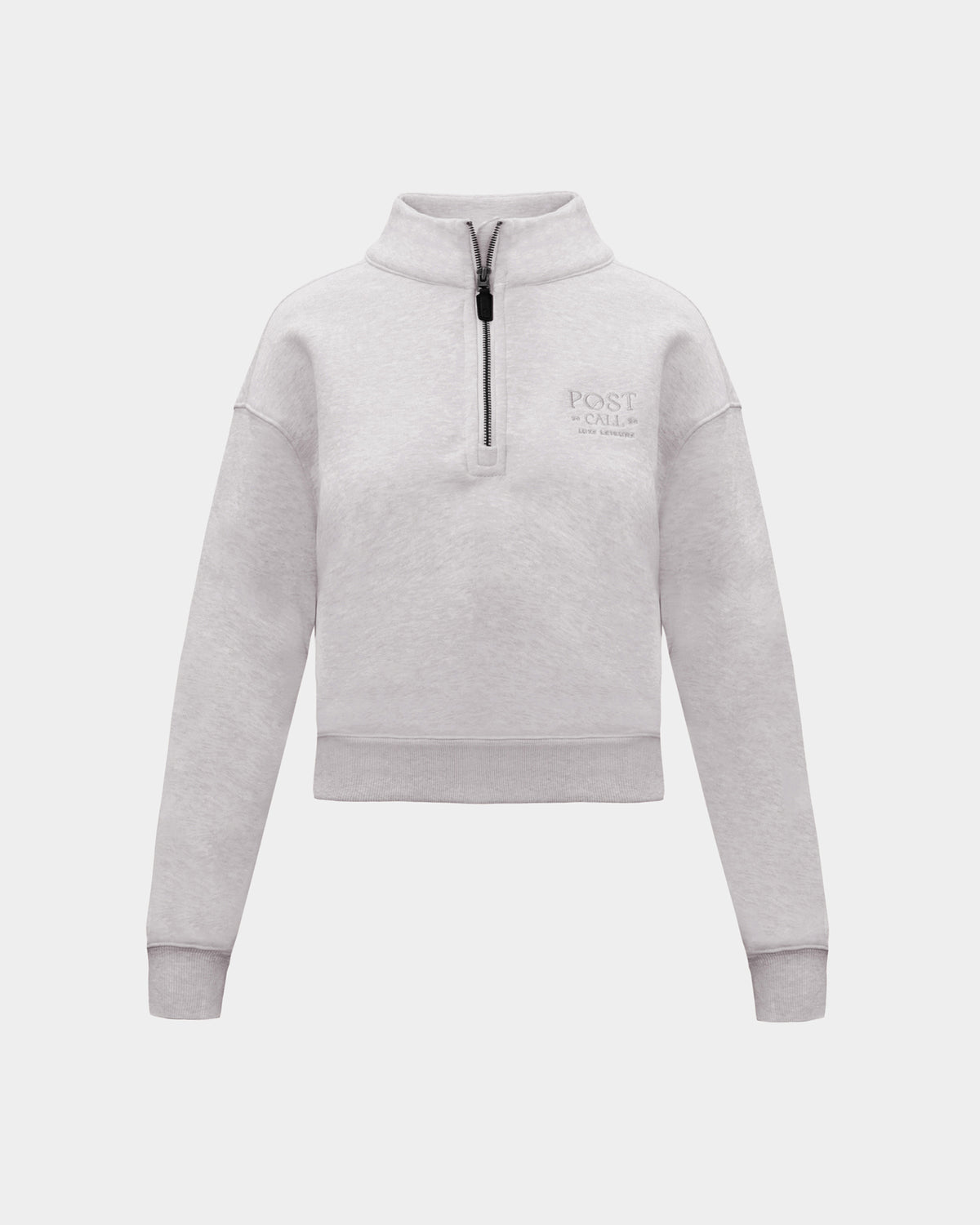 A heather grey long-sleeve quarter-zip pullover sweatshirt with a small tonal 'POST CALL' logo on the left chest, displayed on a clean light gray background.
