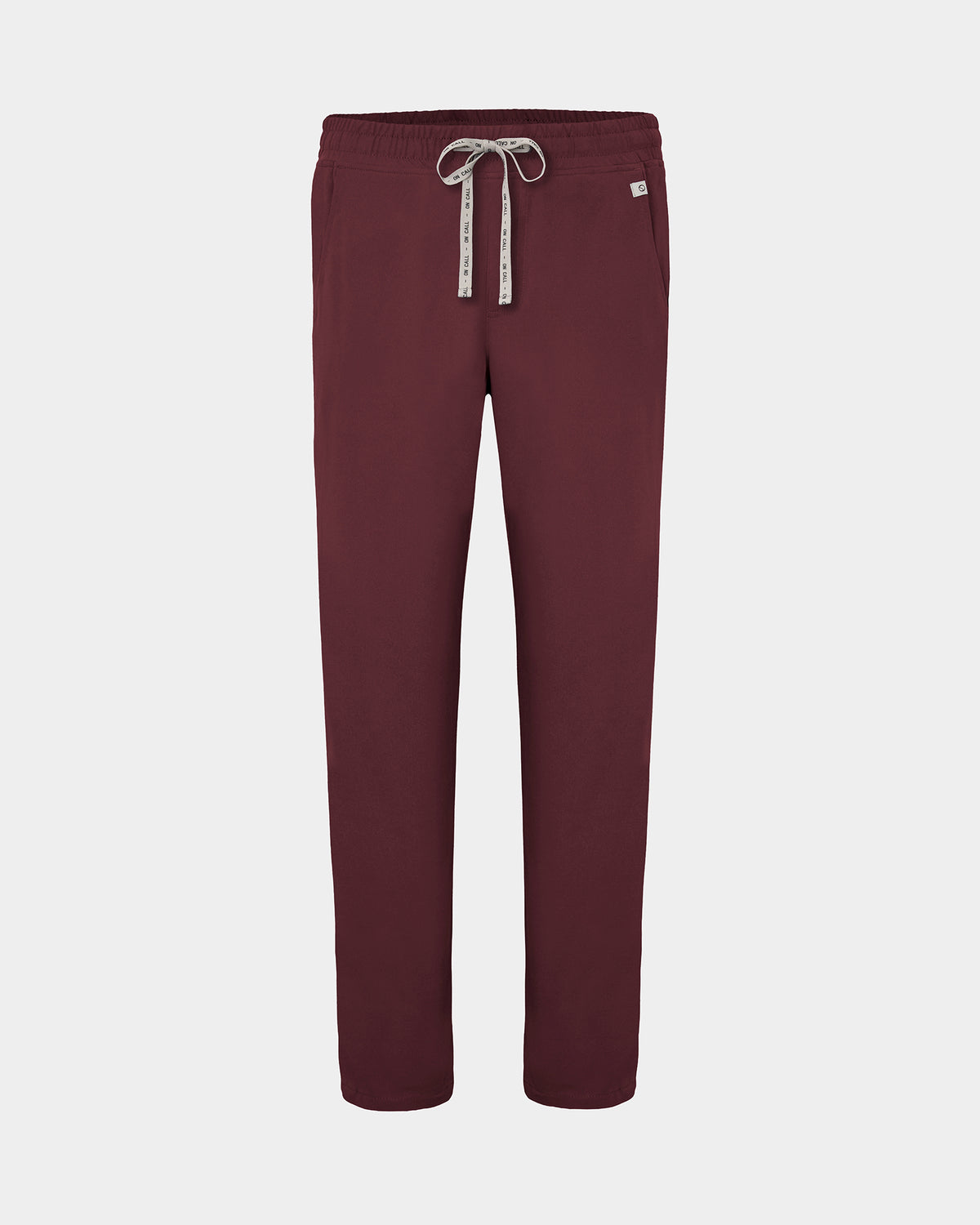 A pair of heme red straight leg scrub pants with a logo drawstring, displayed against a light gray background.