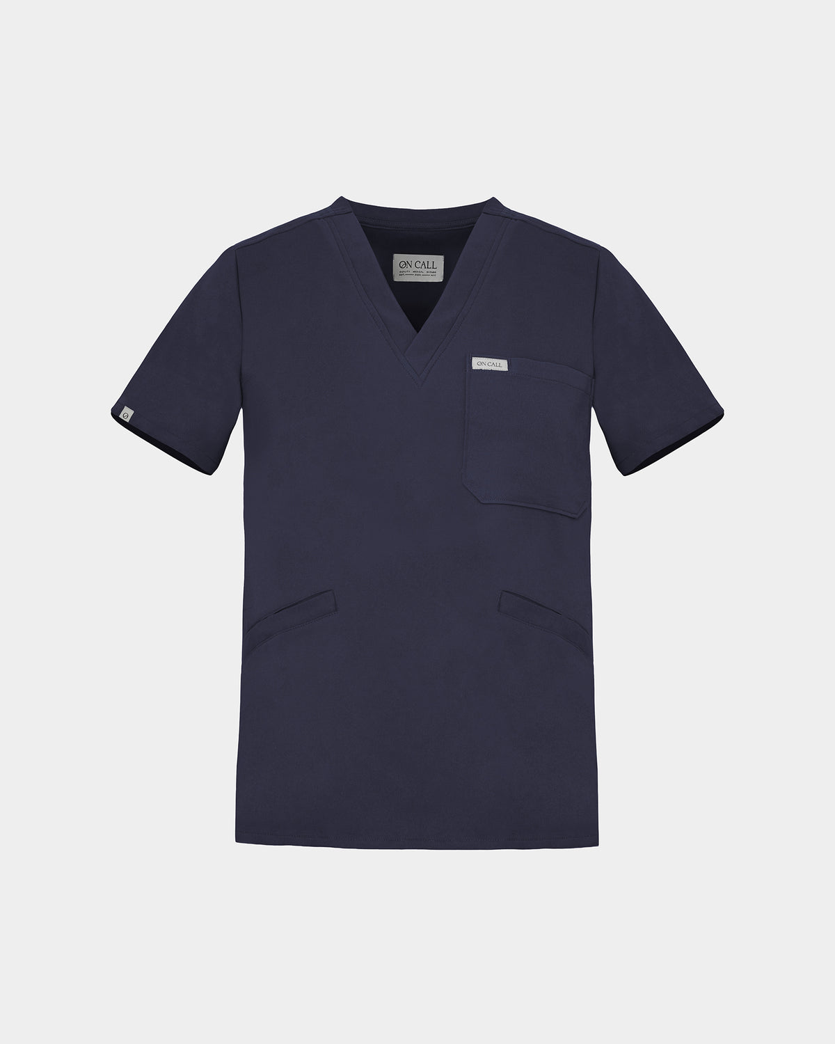 A v-neck navy scrub shirt with a chest pocket and two lower pockets on the front.