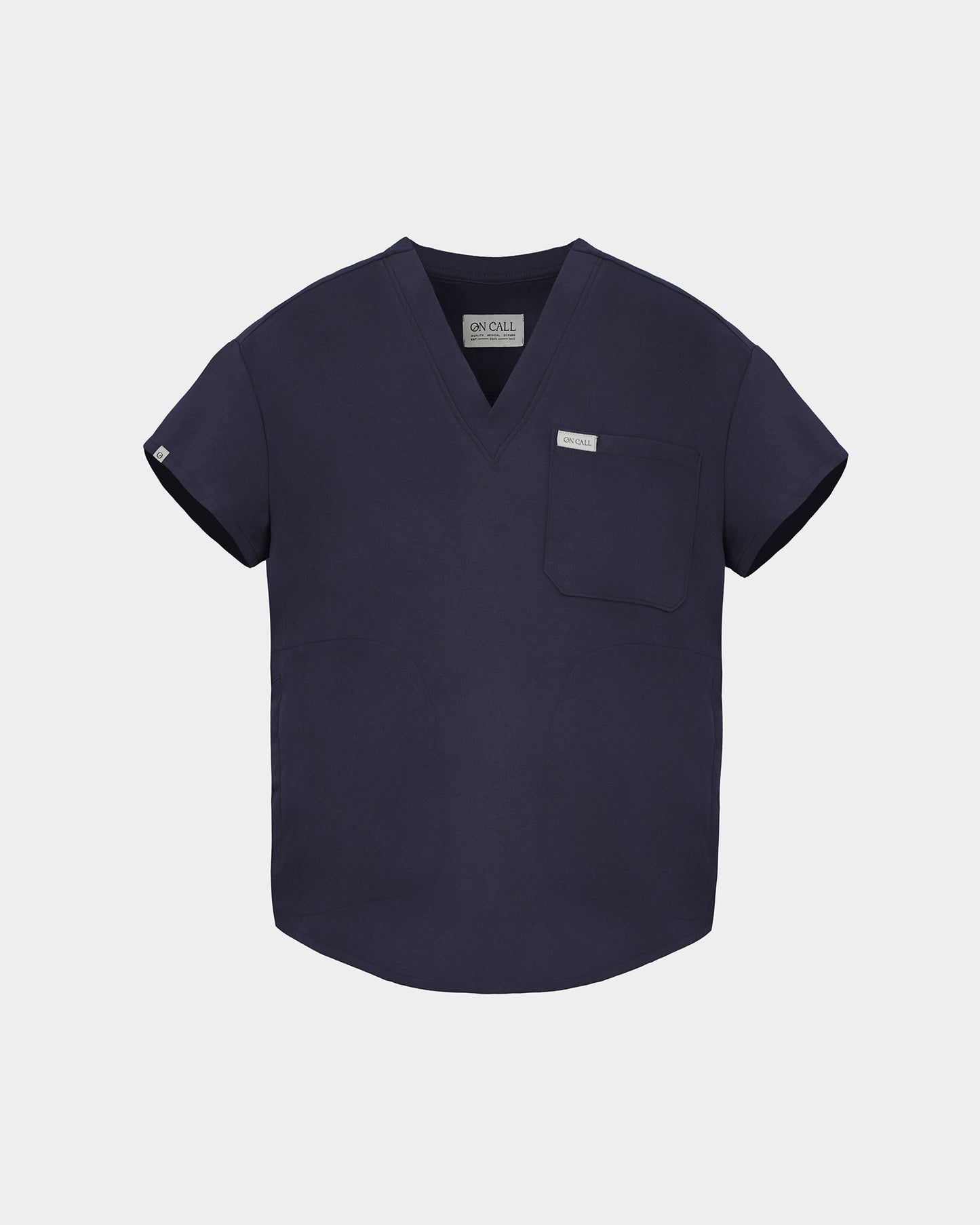 A navy blue scrub top with a V-neck, short sleeves, and a chest pocket, shown against a light gray background.