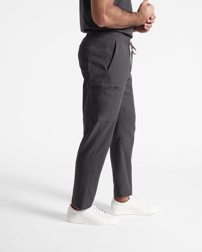 Side view of men's cargo scrub pant in dark grey's