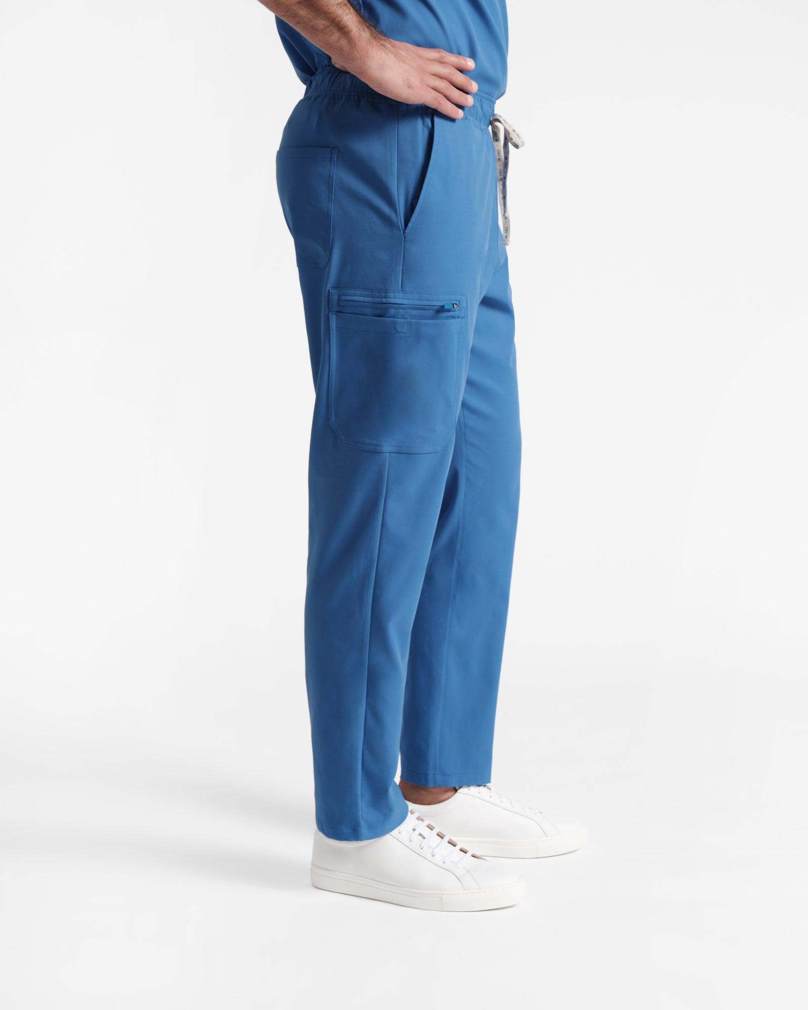 Side view of men's cargo scrub pant in venous blue