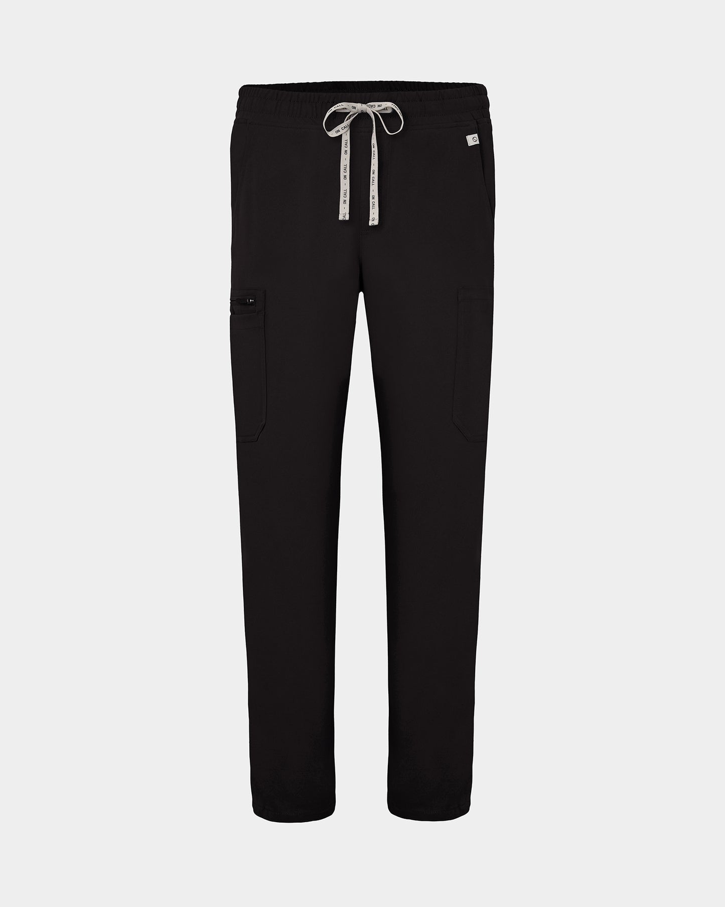 Black scrub pants with cargo pockets, a logo drawstring tie, set against a solid light grey background.