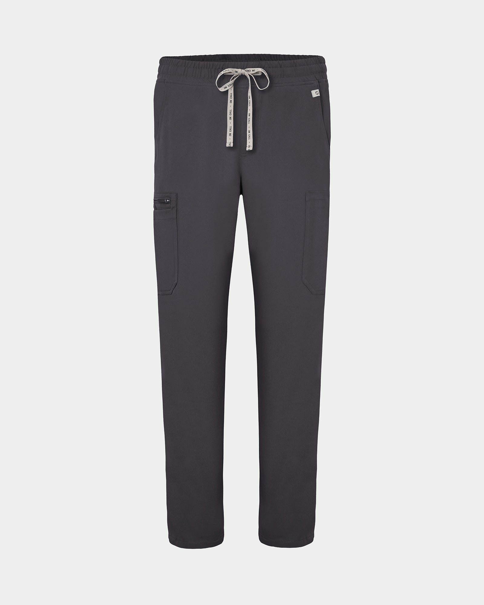 Dark gray scrub pants with a drawstring waist and cargo pockets, shown flat on a light gray background.
