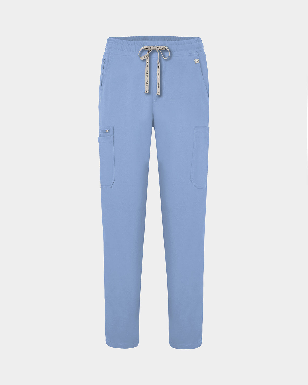 Light blue scrub pants with a drawstring waist, side cargo pockets, and a small logo on the upper right hip, shown against a light gray background.