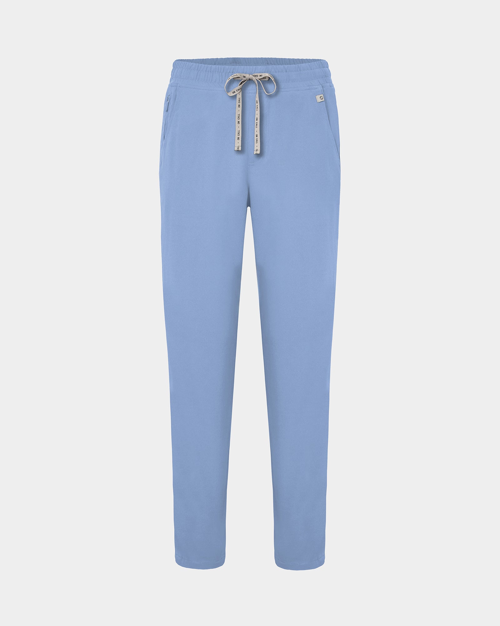 Light blue straight leg scrub pants with a logo drawstring tie.