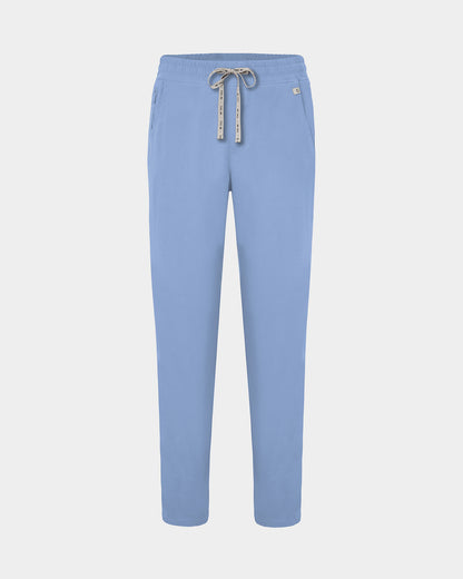 Light blue straight leg scrub pants with a logo drawstring tie.