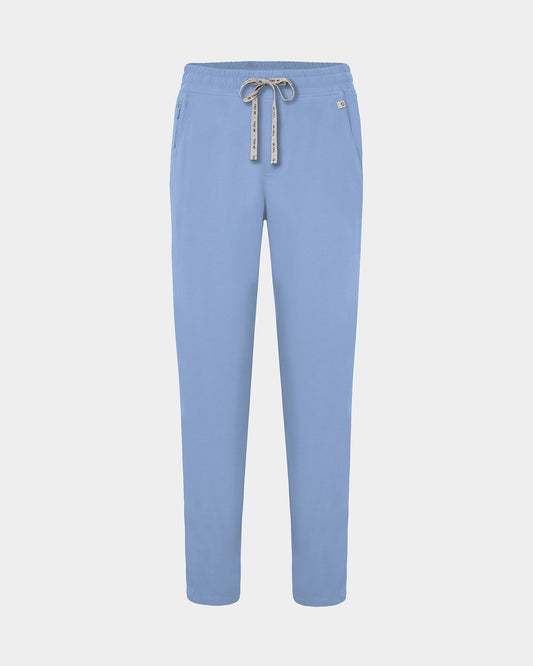 Light blue straight leg scrub pants with a logo drawstring tie.