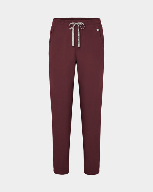 Heme red color straight leg scrub pants with a logo drawstring tie, two waist pockets, including one with a hidden zip compartment.