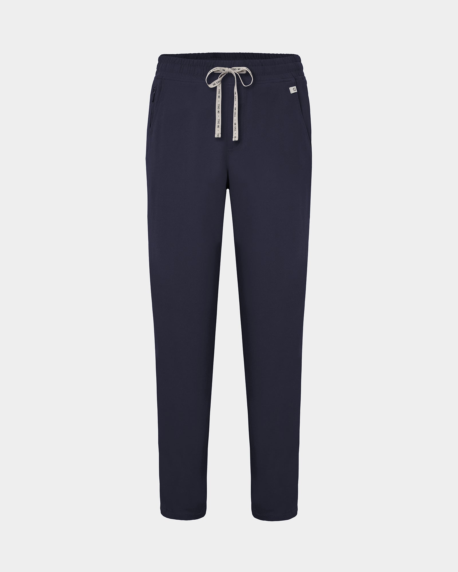Navy straight leg scrub pants with a logo drawstring tie, two waist pockets, including one with a hidden zip compartment.