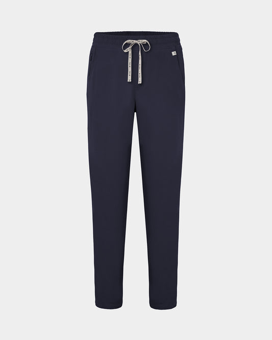 Navy straight leg scrub pants with a logo drawstring tie, two waist pockets, including one with a hidden zip compartment.