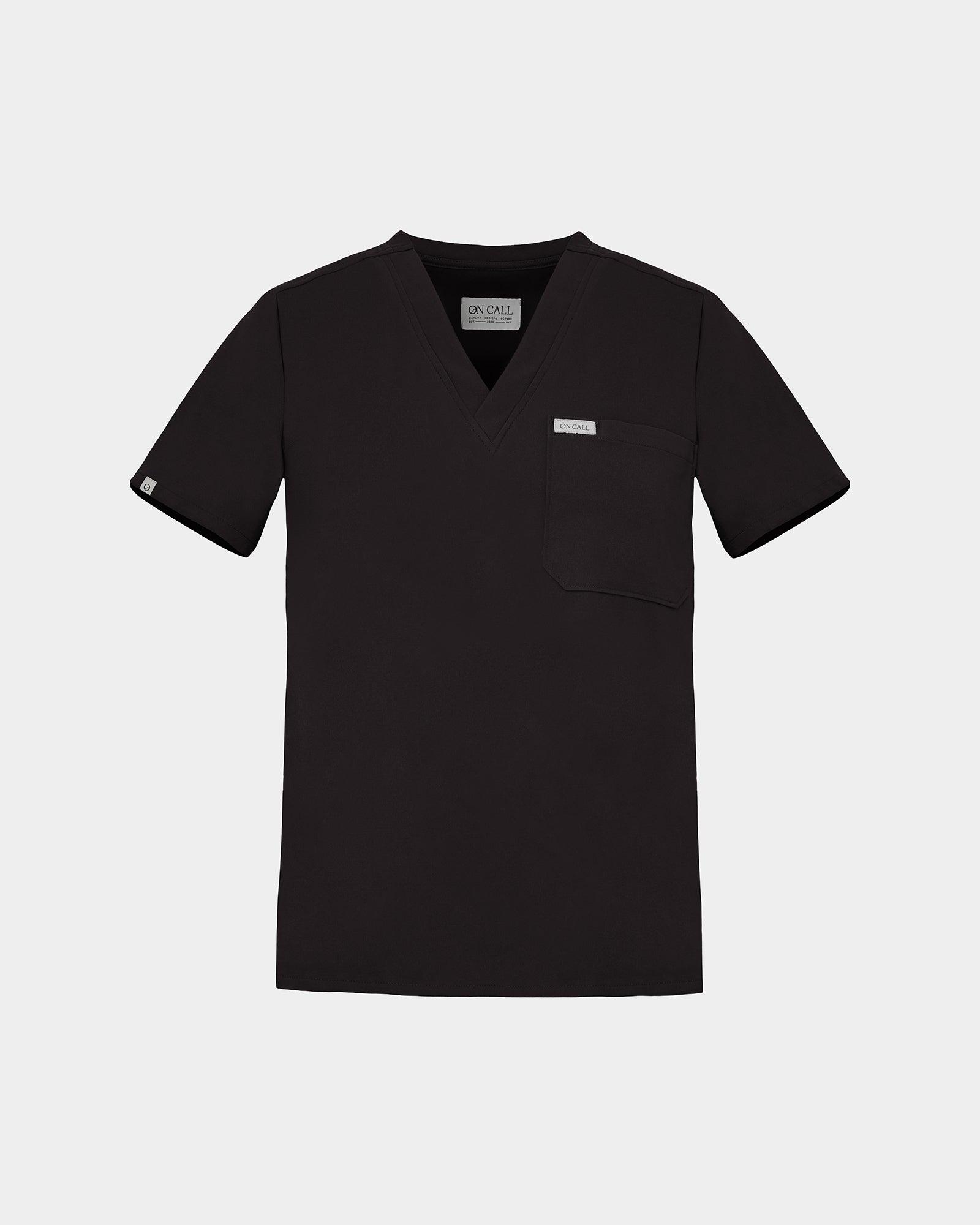 A black short-sleeve V-neck scrub top with a chest pocket, shown flat against a light gray background.