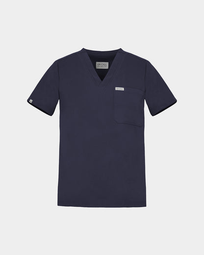 Navy v-neck scrub shirt with a chest pocket featuring a logo label on the pocket and on the sleeve.
