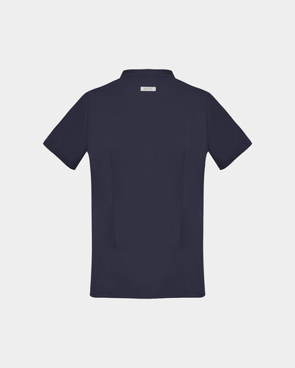 A dark navy blue short-sleeve scrub shirt shown from the back, featuring two darts, centered on a light gray background.