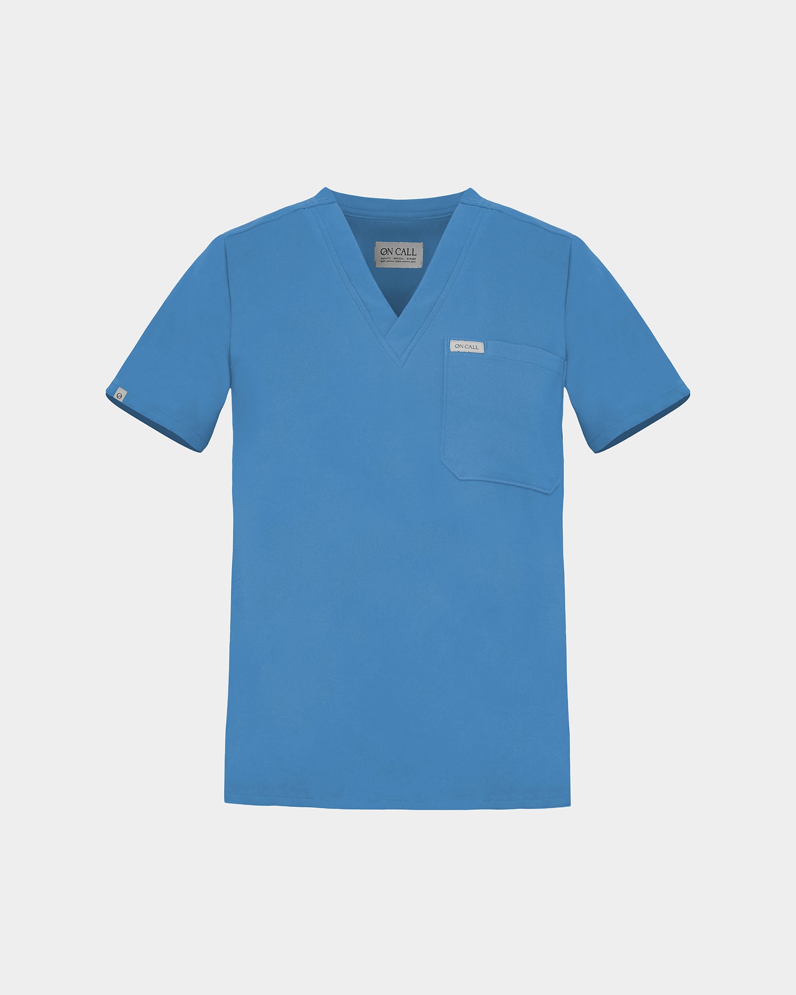V-neck scrub shirt in a bright blue color, featuring a chest pocket with a logo label.
