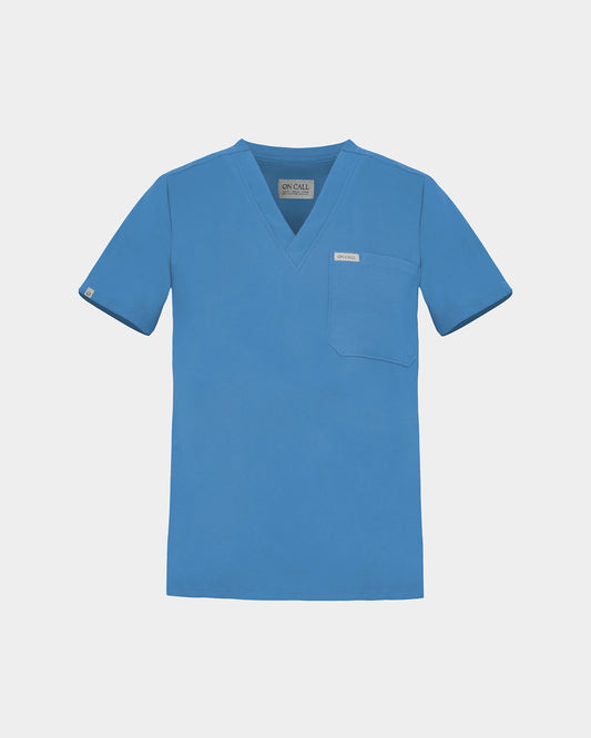 V-neck scrub shirt in a bright blue color, featuring a chest pocket with a logo label.