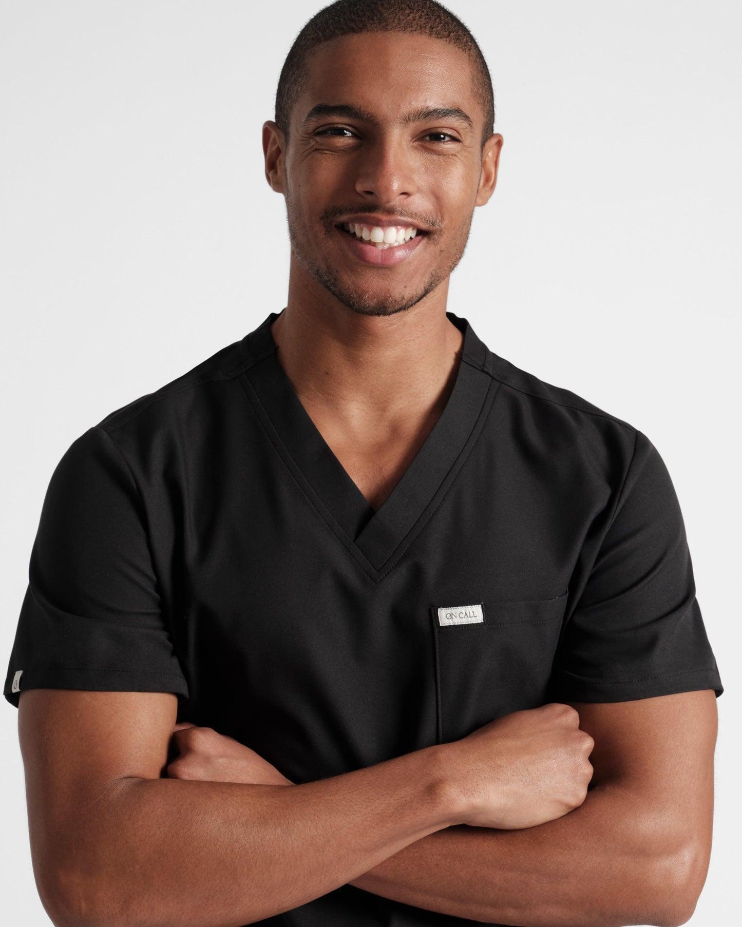 Men's scrub top in black