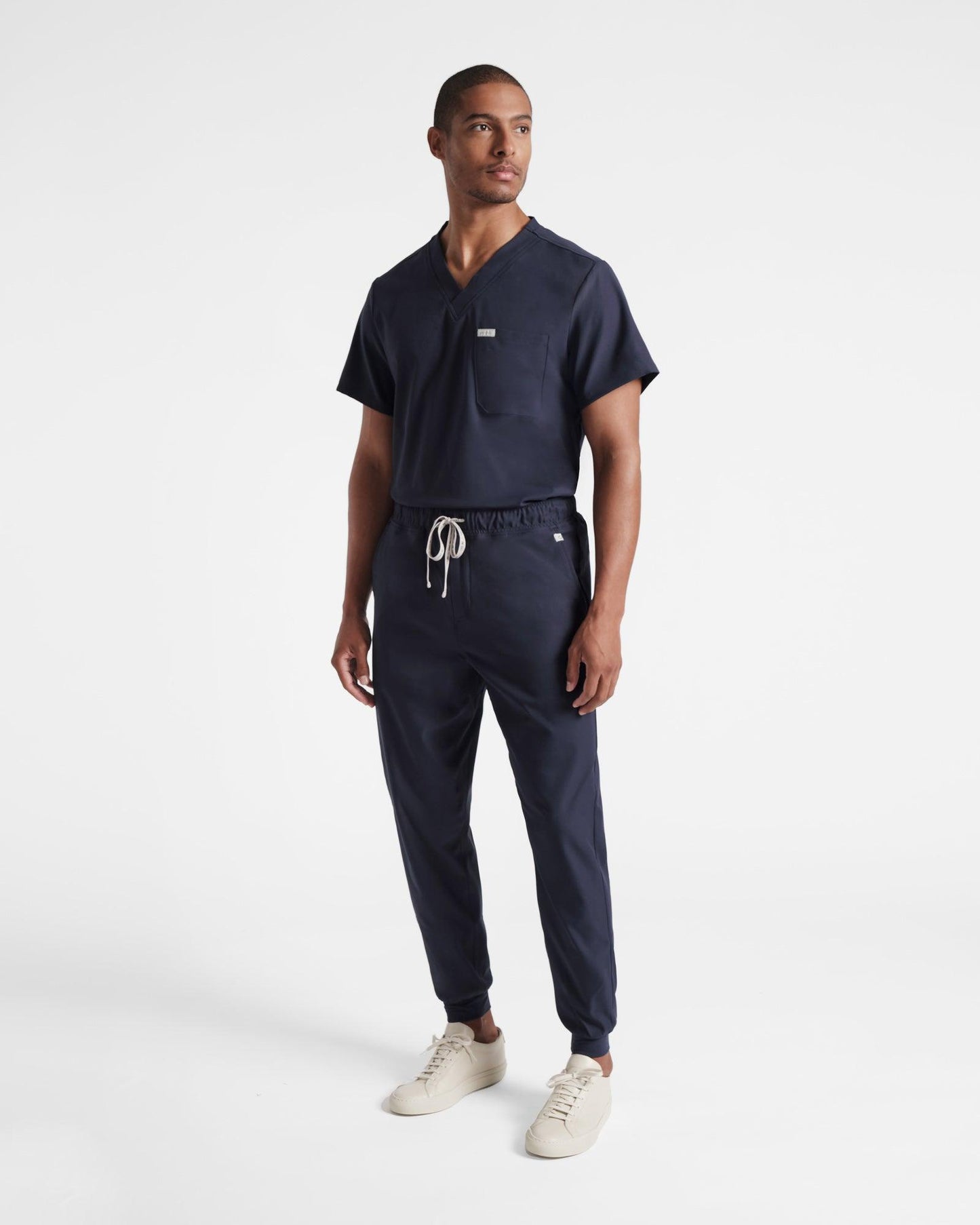 Men's classic navy scrub top with chest pocket 