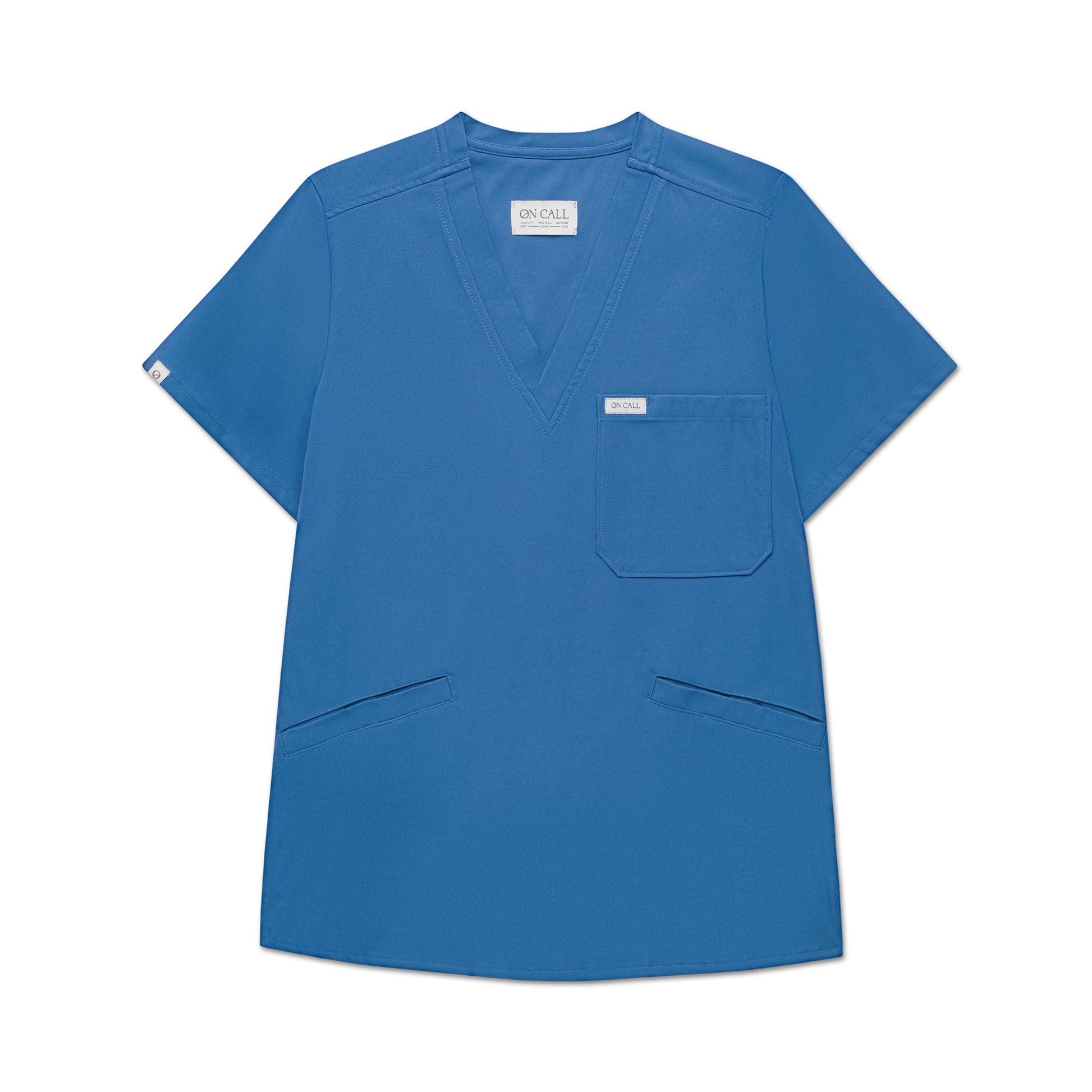 Blue scrub top with a pocket on a white background