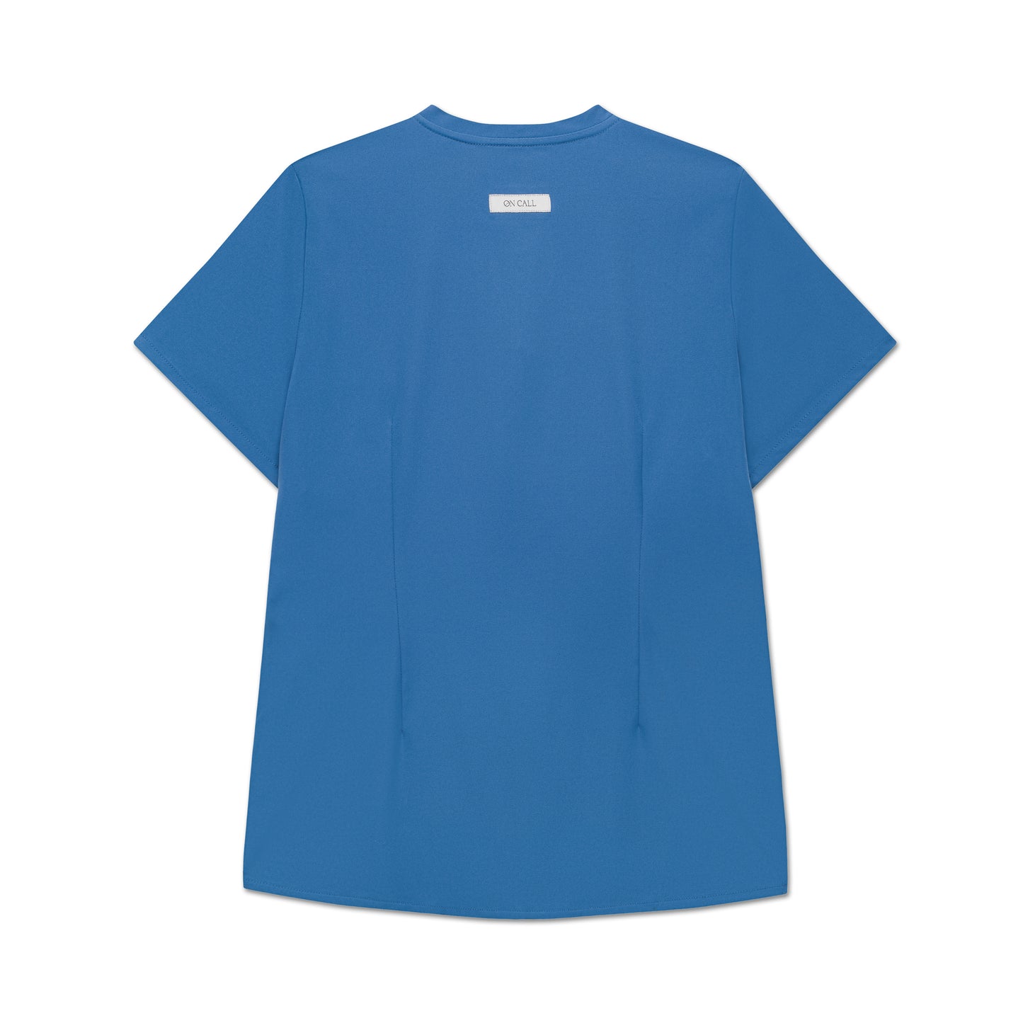 Back of a bright blue scrub shirt with darting on a white background