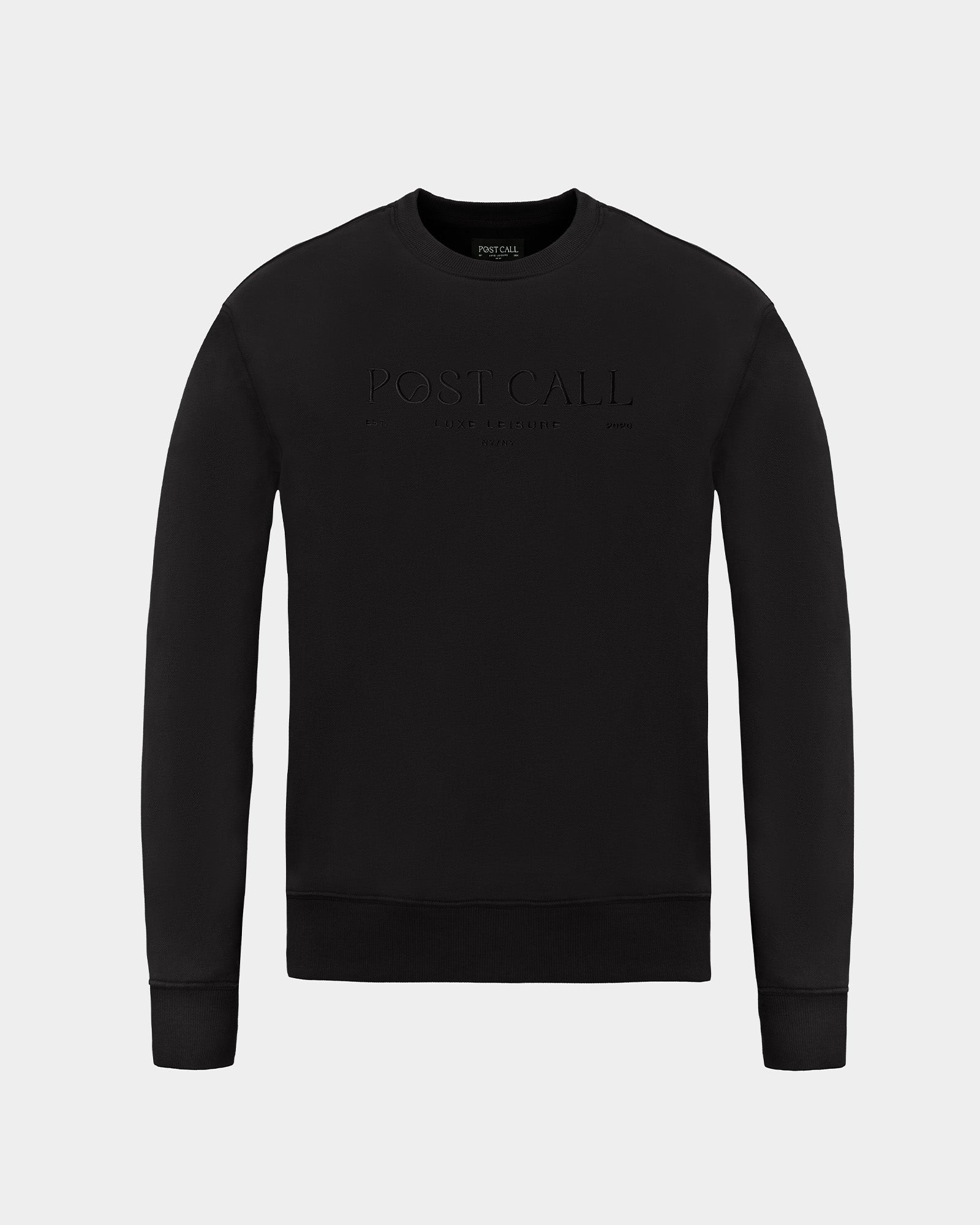A black crewneck sweatshirt with 'POSTCALL' embroidered across the chest in tonal black thread, displayed on a clean light gray background.