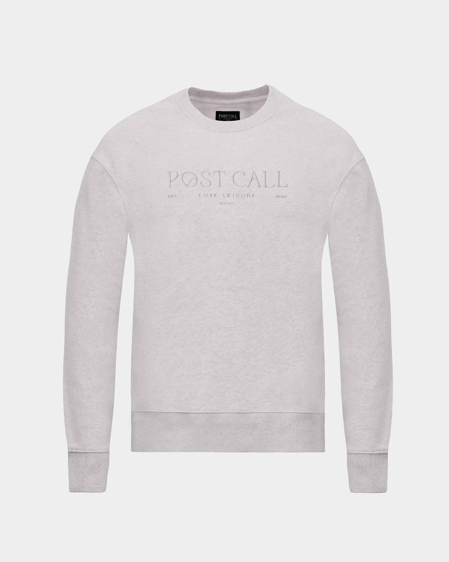 A light gray crewneck sweatshirt with 'POST CALL' embroidered in a subtle, tonal thread across the chest, displayed on a clean light gray background.