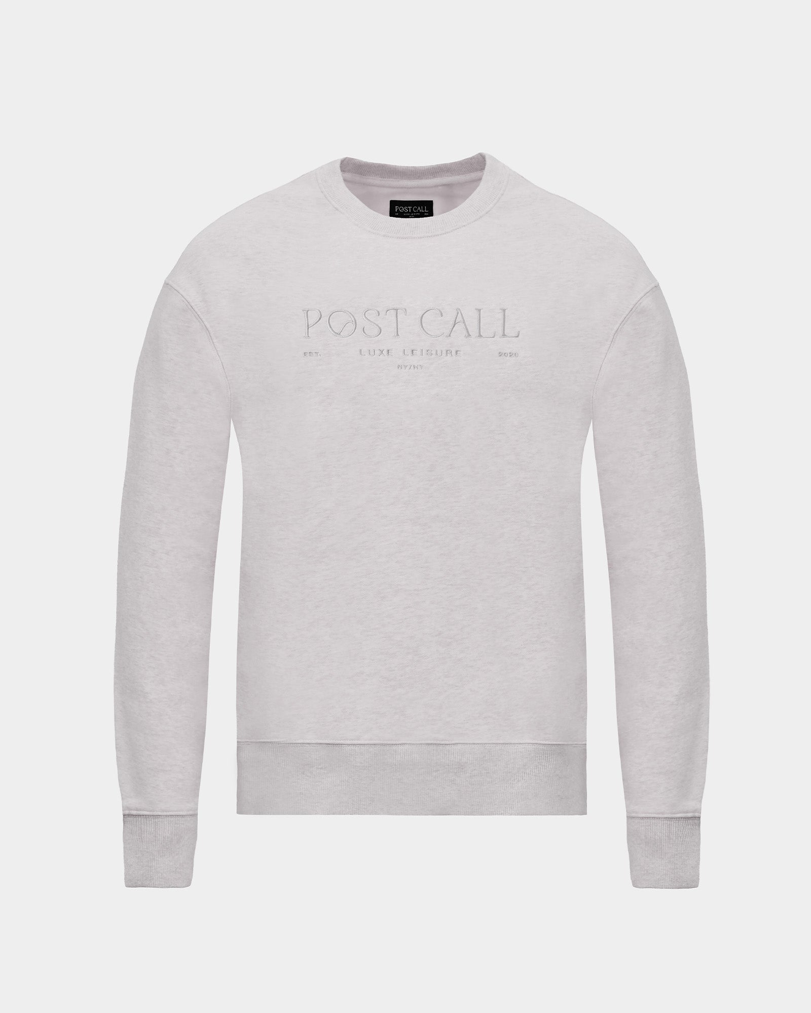 A light gray crewneck sweatshirt with 'POST CALL' embroidered in a subtle, tonal thread across the chest, displayed on a clean light gray background.