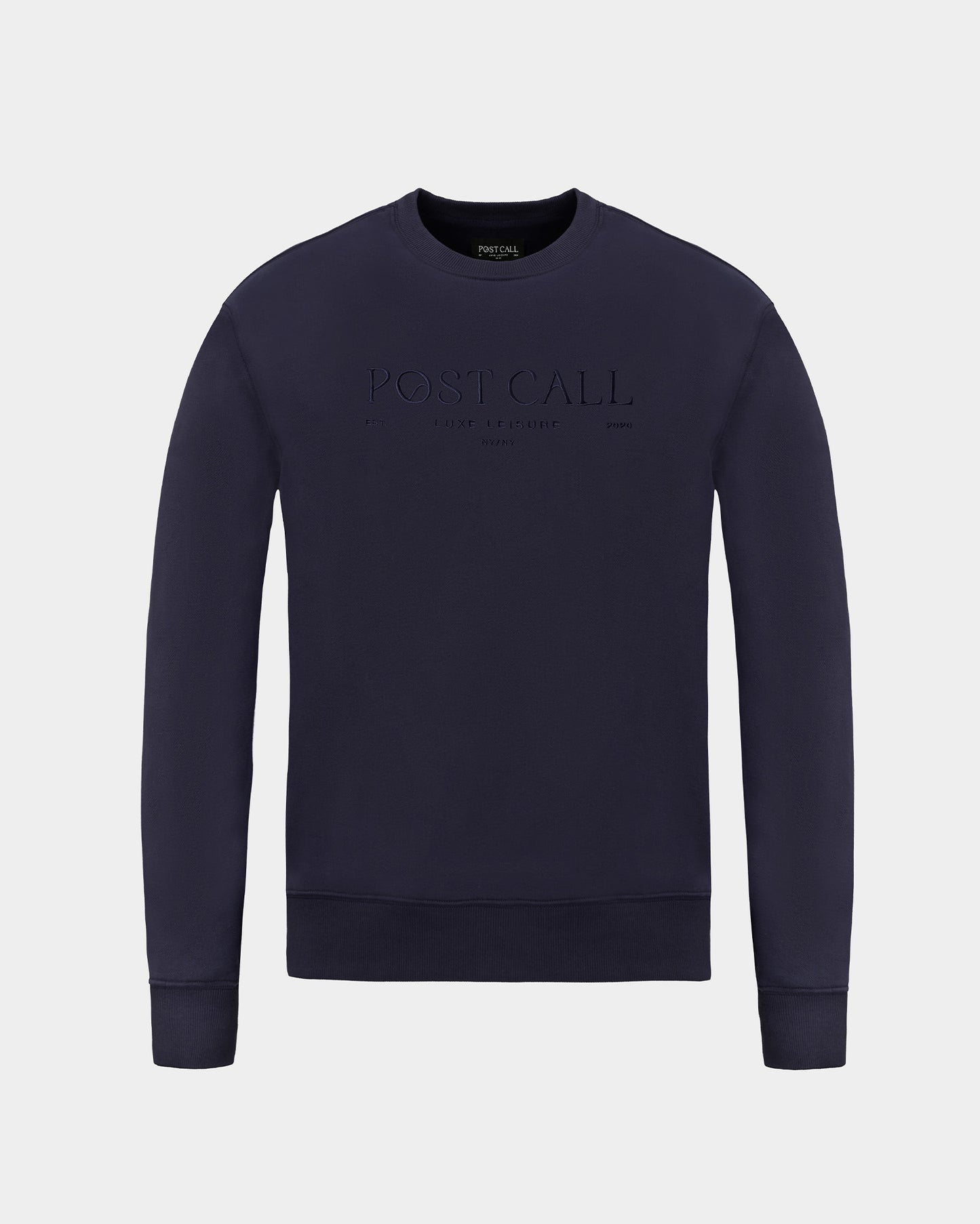 A dark navy blue crewneck sweatshirt with 'POST CALL' embroidered in tonal thread across the chest, displayed on a light gray background.
