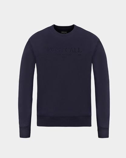 A dark navy blue crewneck sweatshirt with 'POST CALL' embroidered in tonal thread across the chest, displayed on a light gray background.