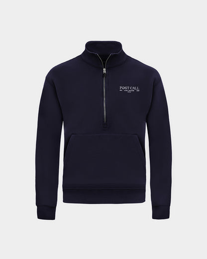 A navy long-sleeve quarter-zip pullover sweatshirt with a small white 'POST CALL' logo on the left chest and kangaroo pocket displayed on a clean light gray background.