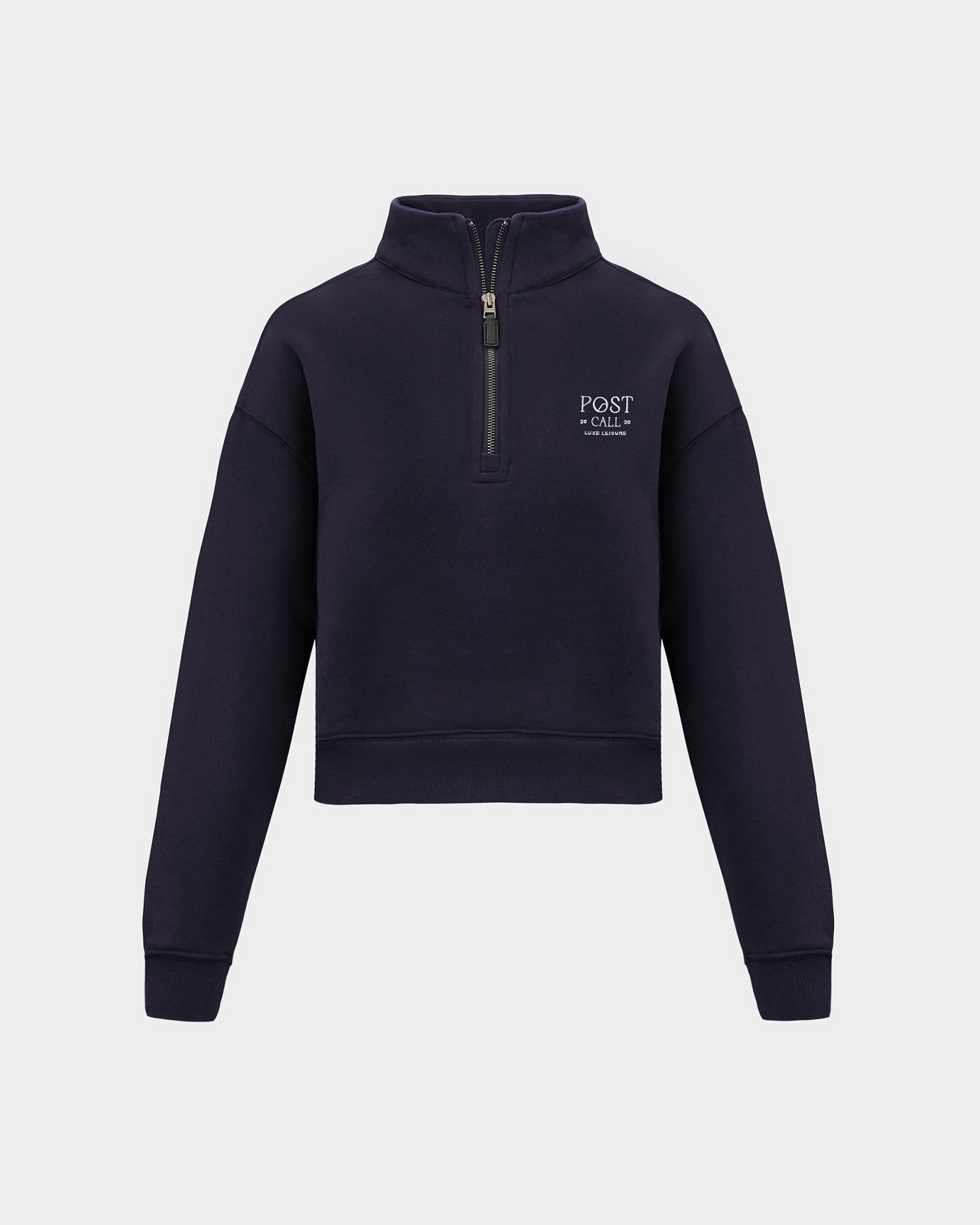 A navy long-sleeve quarter-zip pullover sweatshirt with a small white 'POST CALL' logo on the left chest displayed on a clean light gray background.
