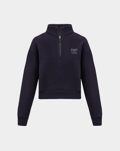 A navy long-sleeve quarter-zip pullover sweatshirt with a small white 'POST CALL' logo on the left chest displayed on a clean light gray background.
