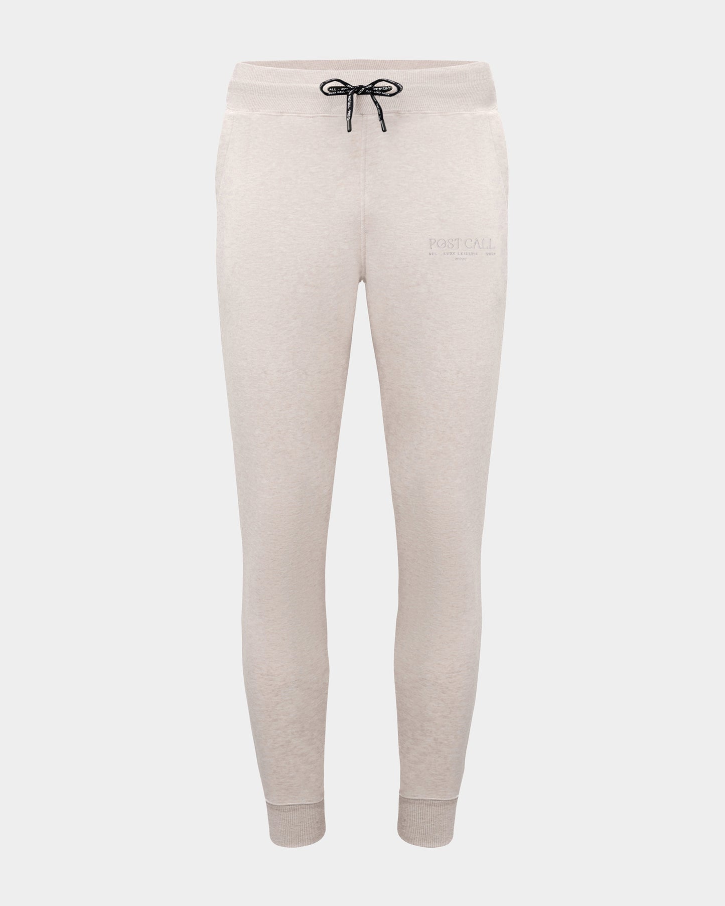 Heather beige jogger lounge pants with ankle cuffs, a logo drawstring, and a tonal embroidered 'POST CALL' logo on the left thigh.