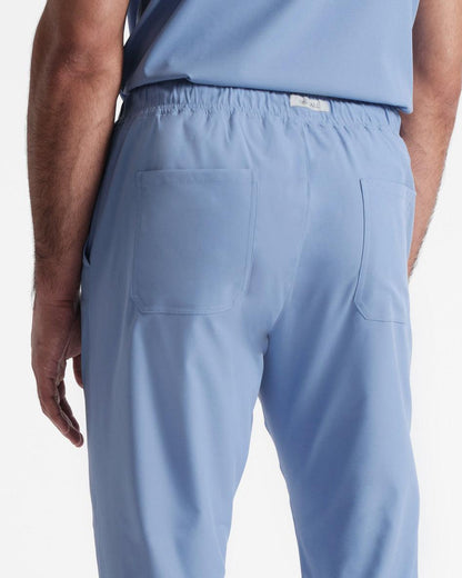 Back side view of men's straight leg scrub pant in ciel blue