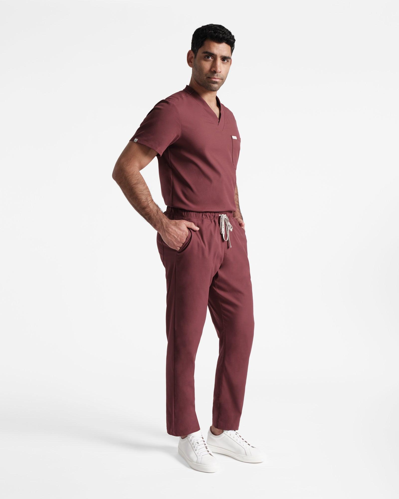 Full body shot of men's heme red scrub pant with straight leg and pockets