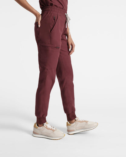 Side view of women's jogger cargo scrub in heme red