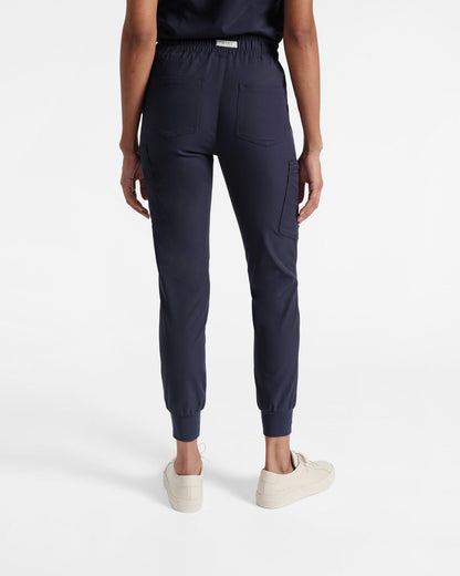 Back side view of women's navy jogger cargo scrub