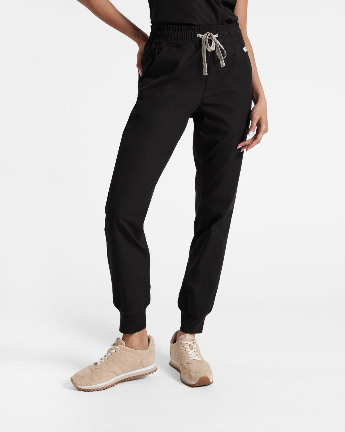 Women's jogger scrub pant in black with elasticated cuffs.