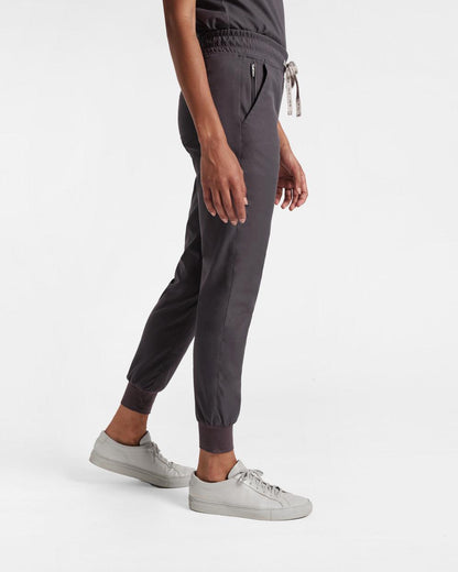 Side view of women's jogger scrub pant in dark grey's