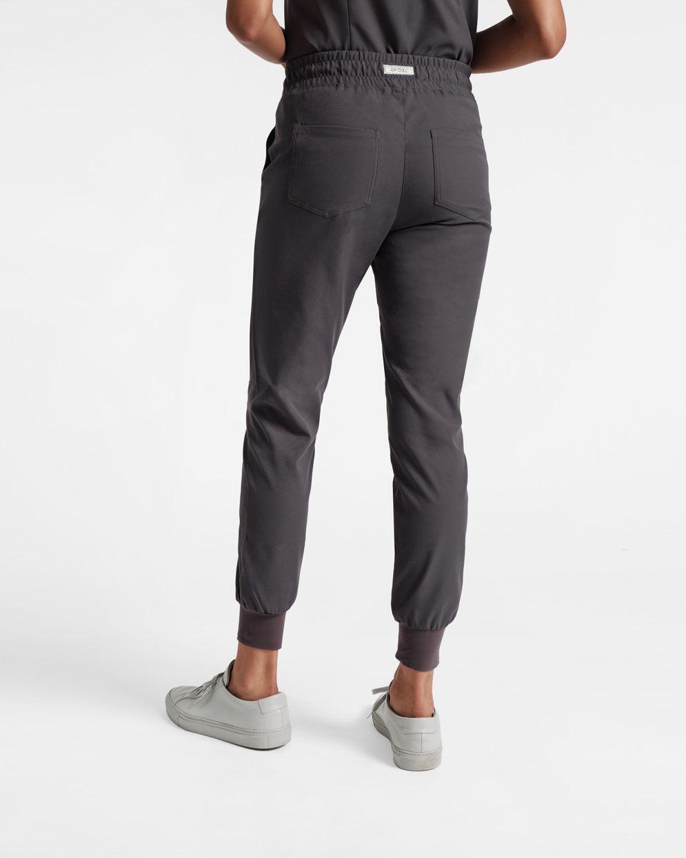 Back side view of women's jogger scrub pant in dark grey's