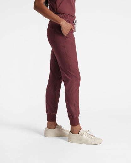 Side view of women's jogger scrub pant in heme red