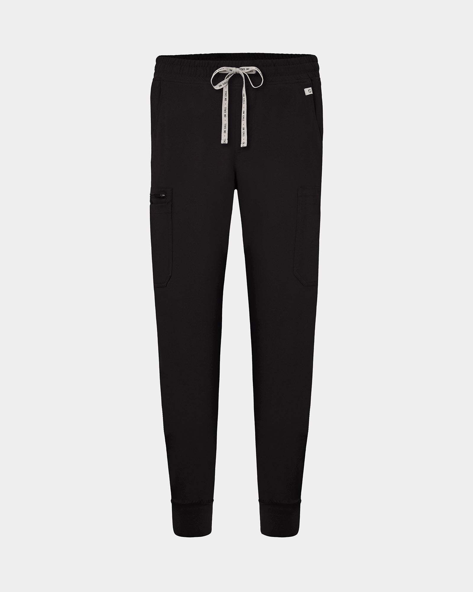 Black cargo jogger scrub pants with a logo drawstring, small logo label on the hip pocket, and ankle cuffs.