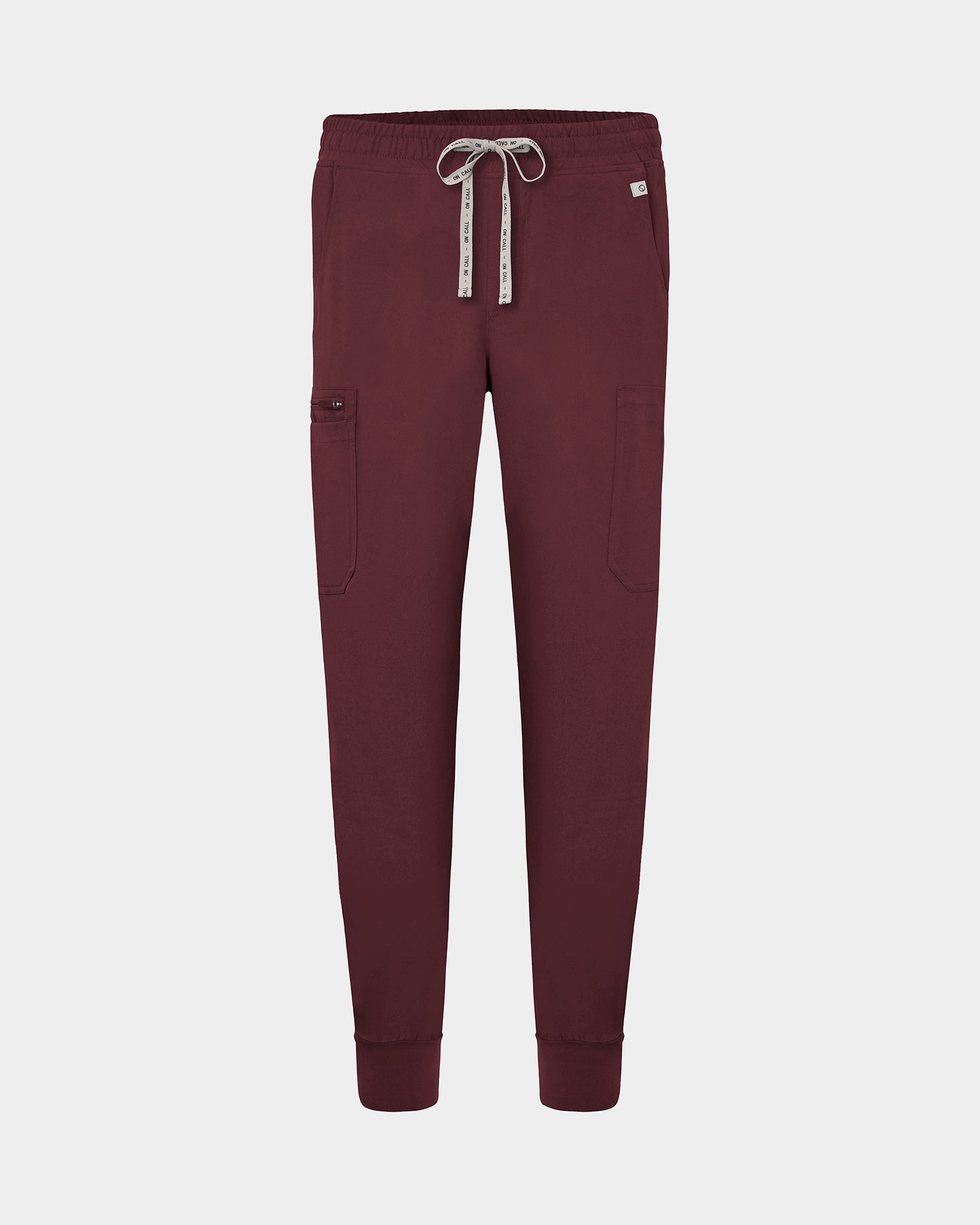 Heme red cargo jogger scrub pants with a logo drawstring, small logo label on the hip pocket, and ankle cuffs.