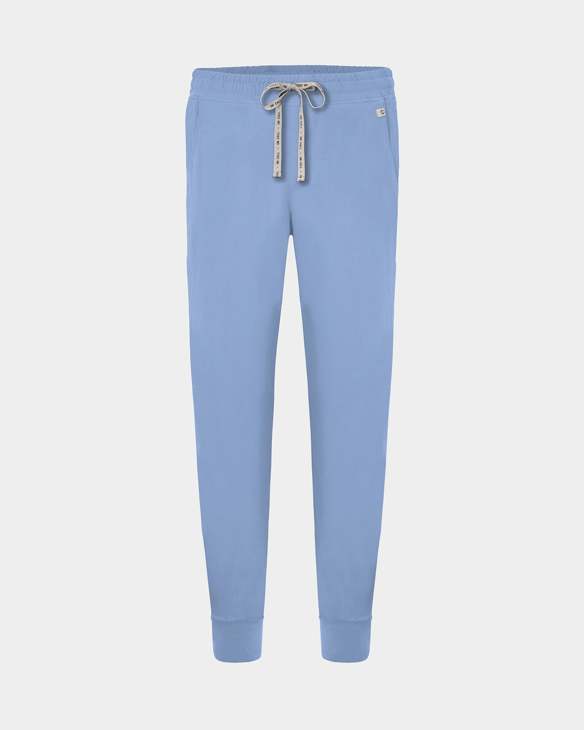 Light blue cargo jogger scrub pants with a logo drawstring, small logo label on the hip pocket, and ankle cuffs.