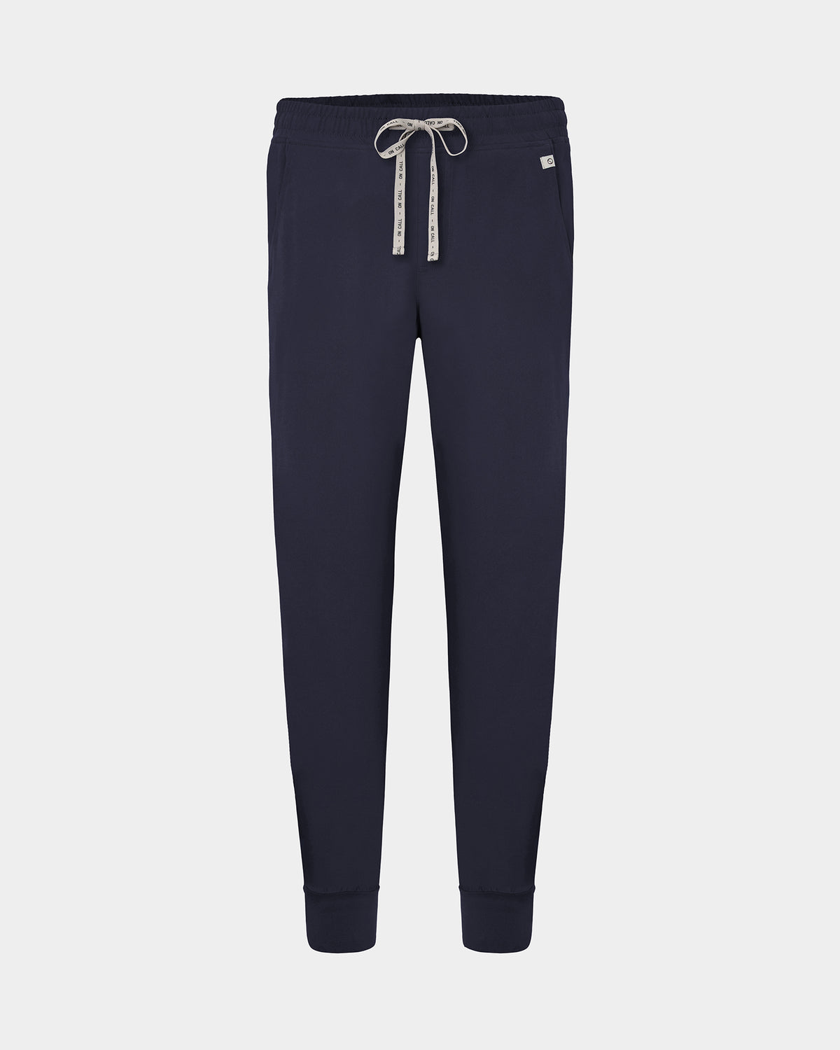 A pair of navy jogger pants with a logo drawstring, displayed on a light gray background.
