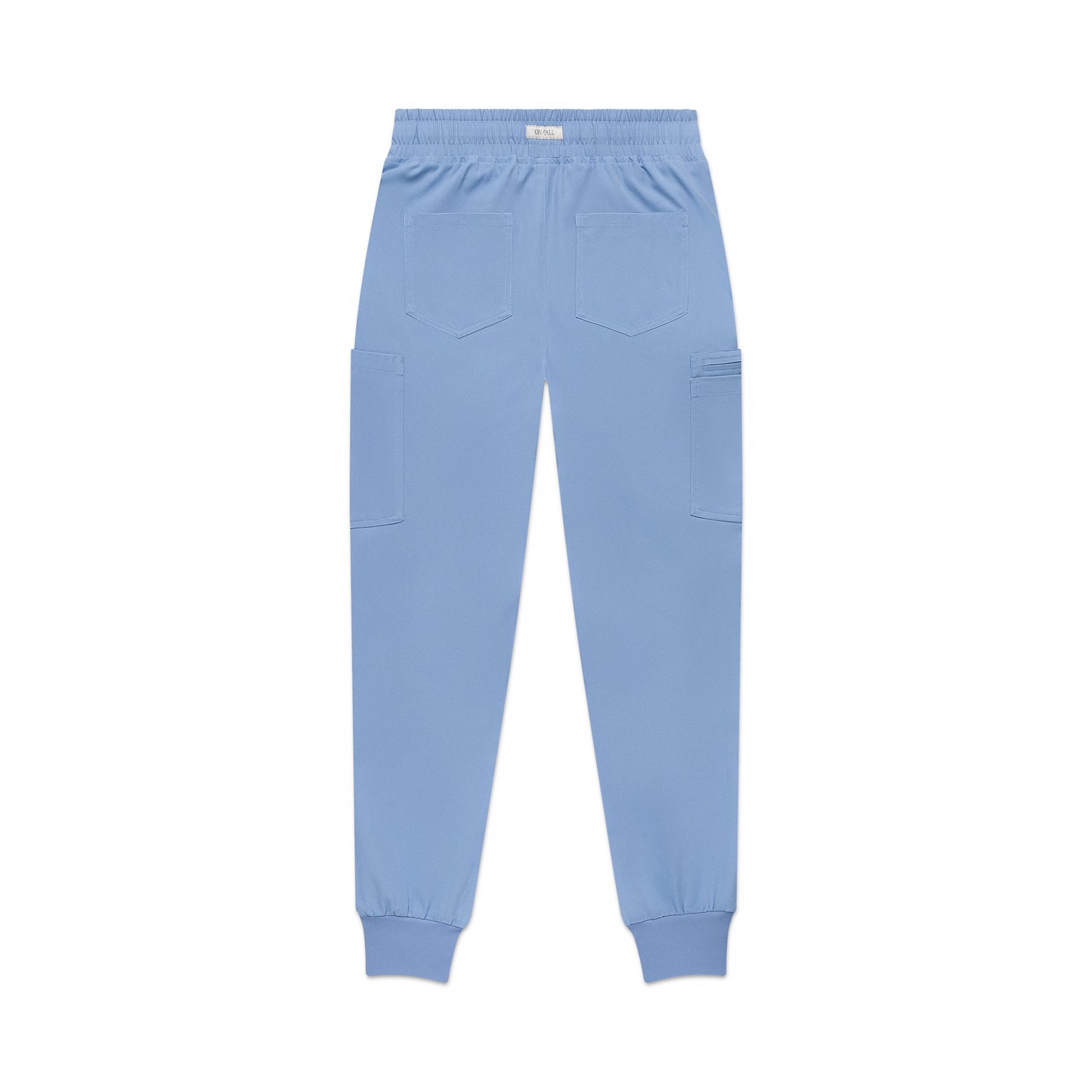 The back of light blue jogger scrub pants on a white background