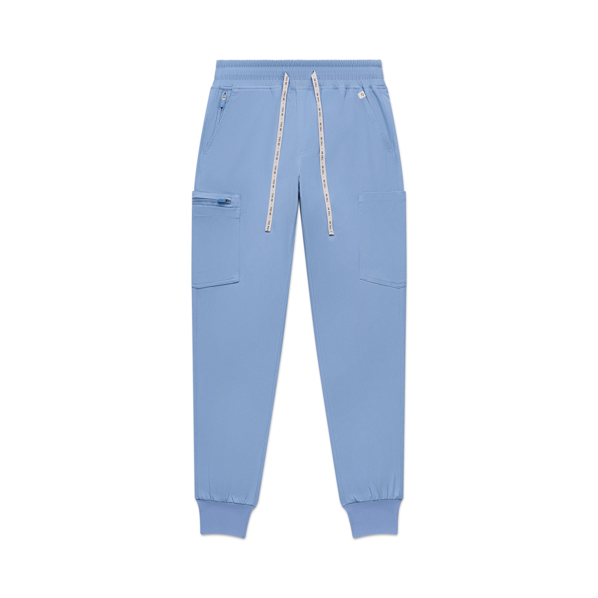 Light blue jogger pants with zippers on a white background