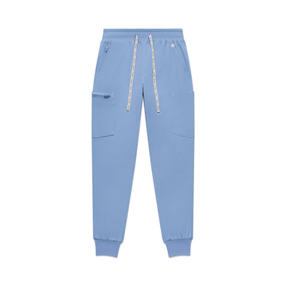 Light blue jogger pants with zippers on a white background