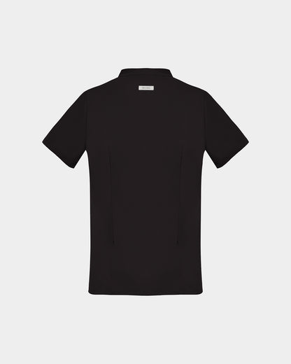 A black short-sleeve scrub shirt with a logo label under the collar, shown from the back on a light gray background.