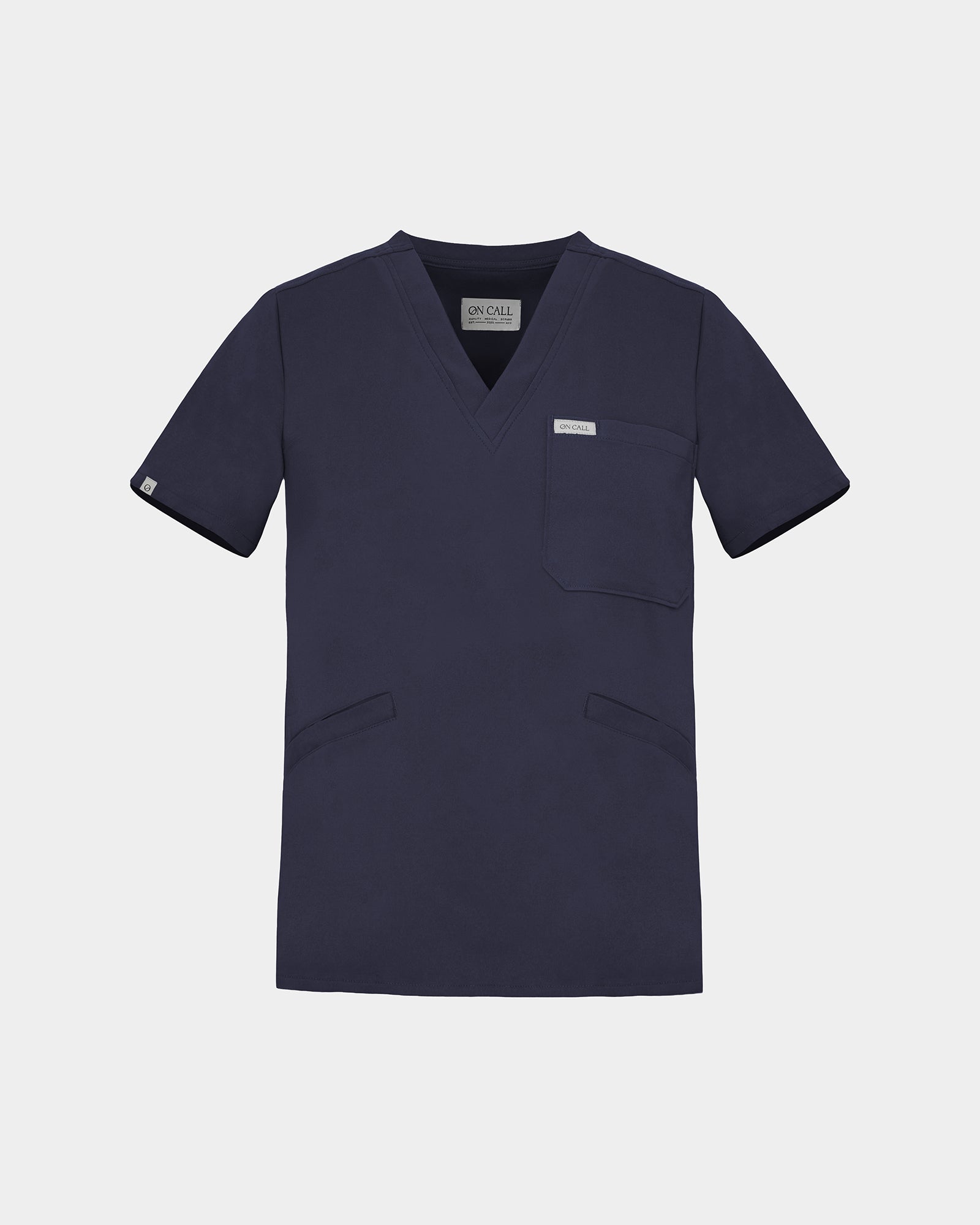 A v-neck navy scrub shirt with a chest pocket and two lower pockets on the front.